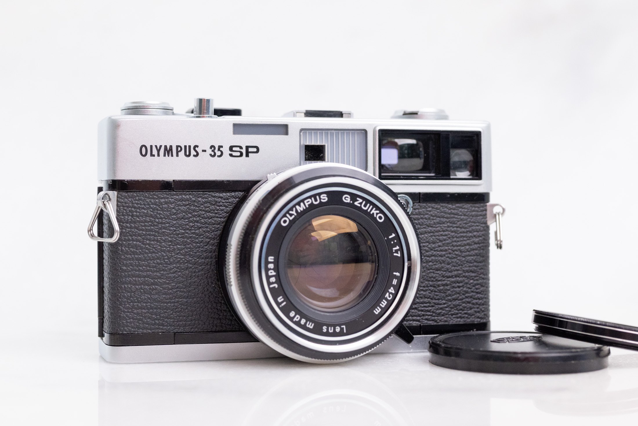 Olympus 35 SP 35mm Film Rangefinder Camera with Filter, Olympus Cap and  Battery - Fully Functional — F Stop Cameras